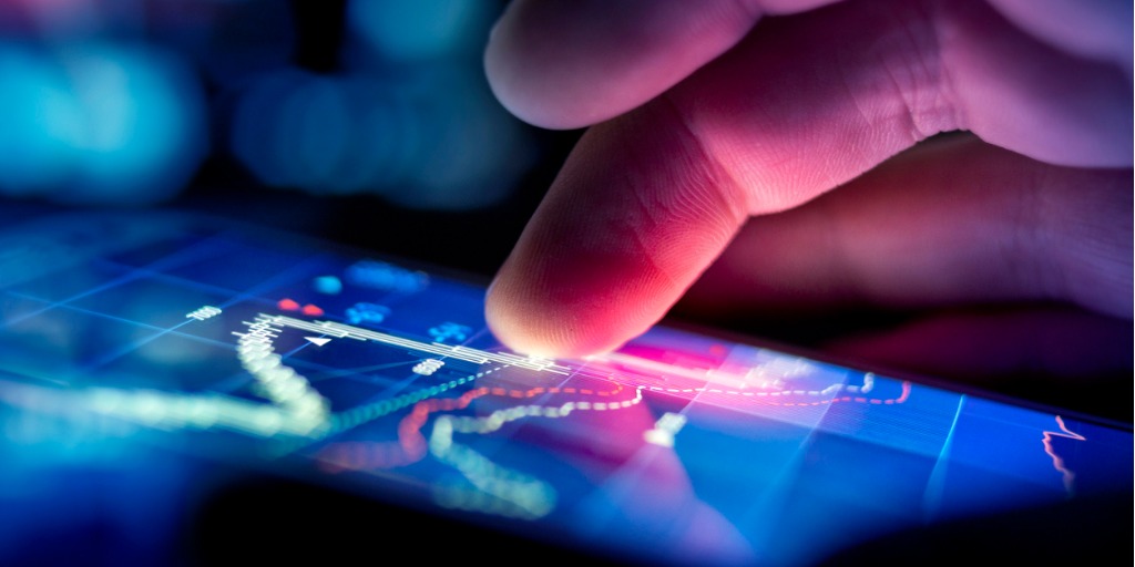 Picture of a hand using a glass touchscreen